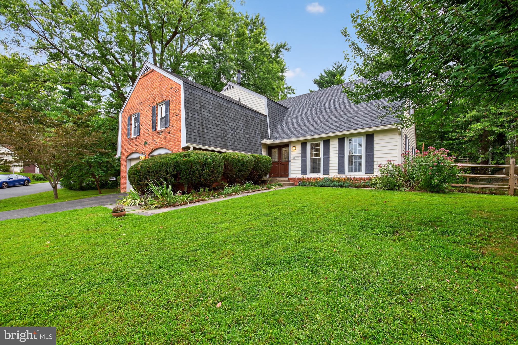 20080 Doolittle Street Gaithersburg, MD 20886 - Photo 2 of 48 a view of a house with a yard