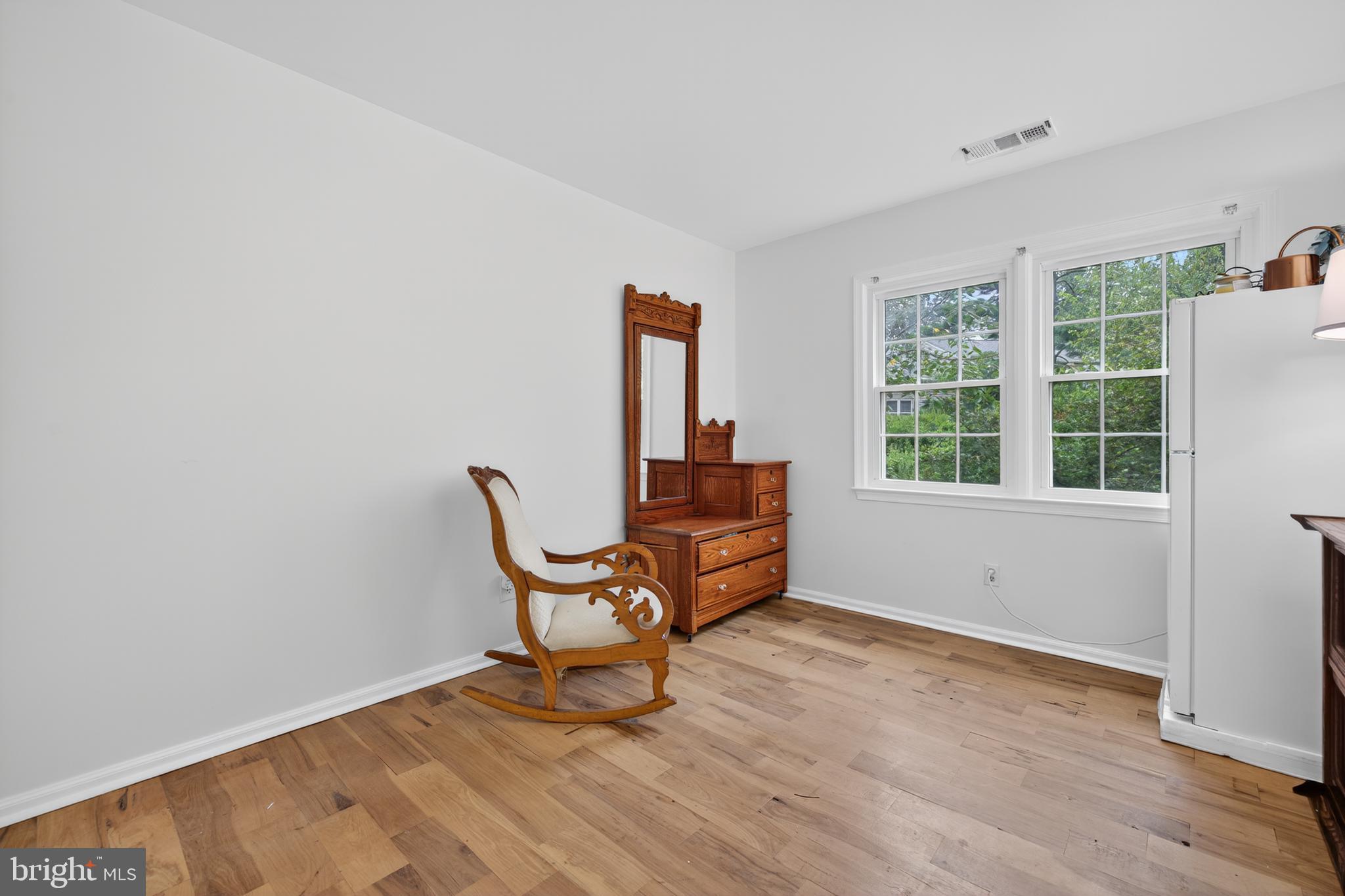 20080 Doolittle Street Gaithersburg, MD 20886 - Photo 33 of 48 a workspace room with wooden floor and windows