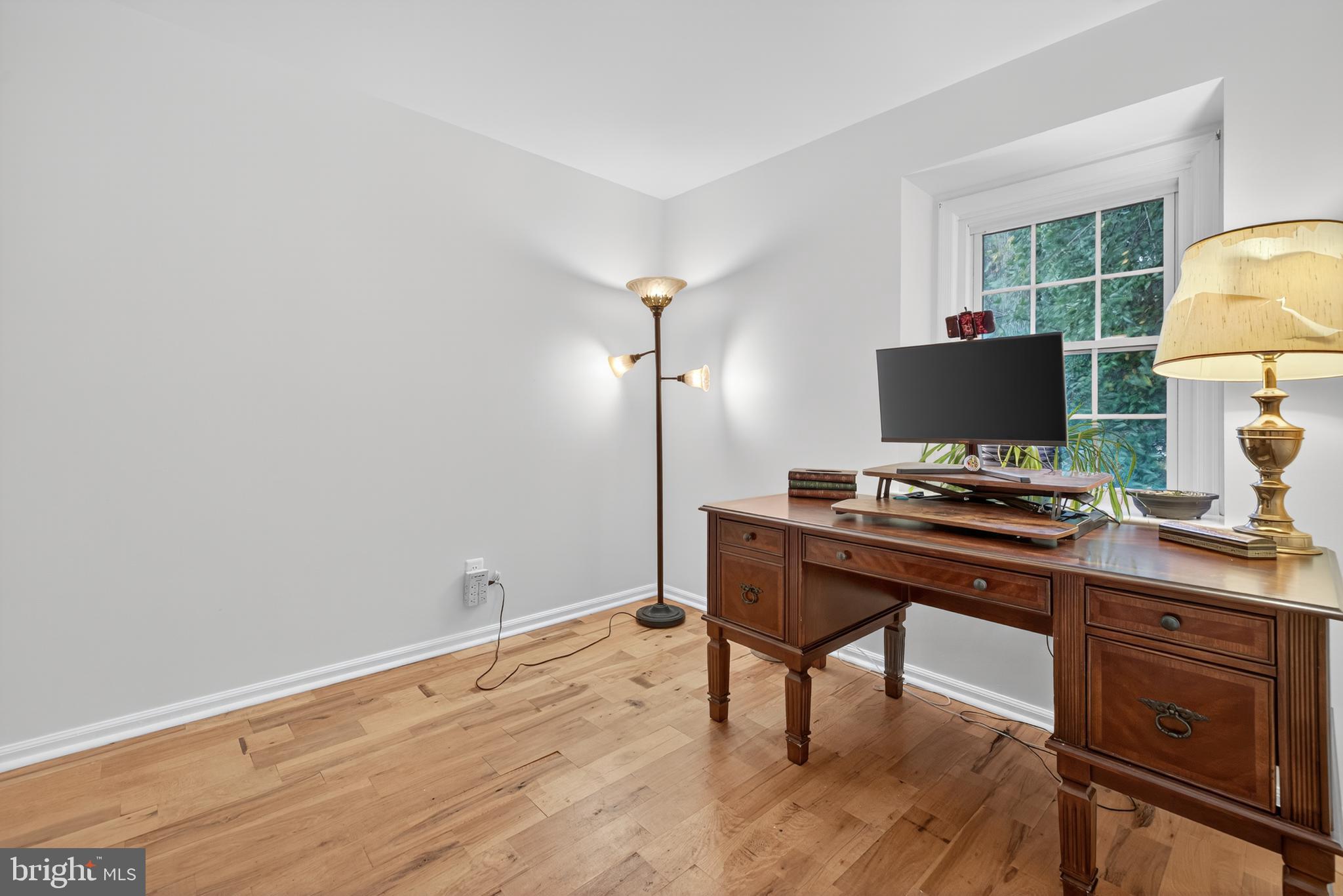 20080 Doolittle Street Gaithersburg, MD 20886 - Photo 35 of 48 a view of a workspace with furniture and a window