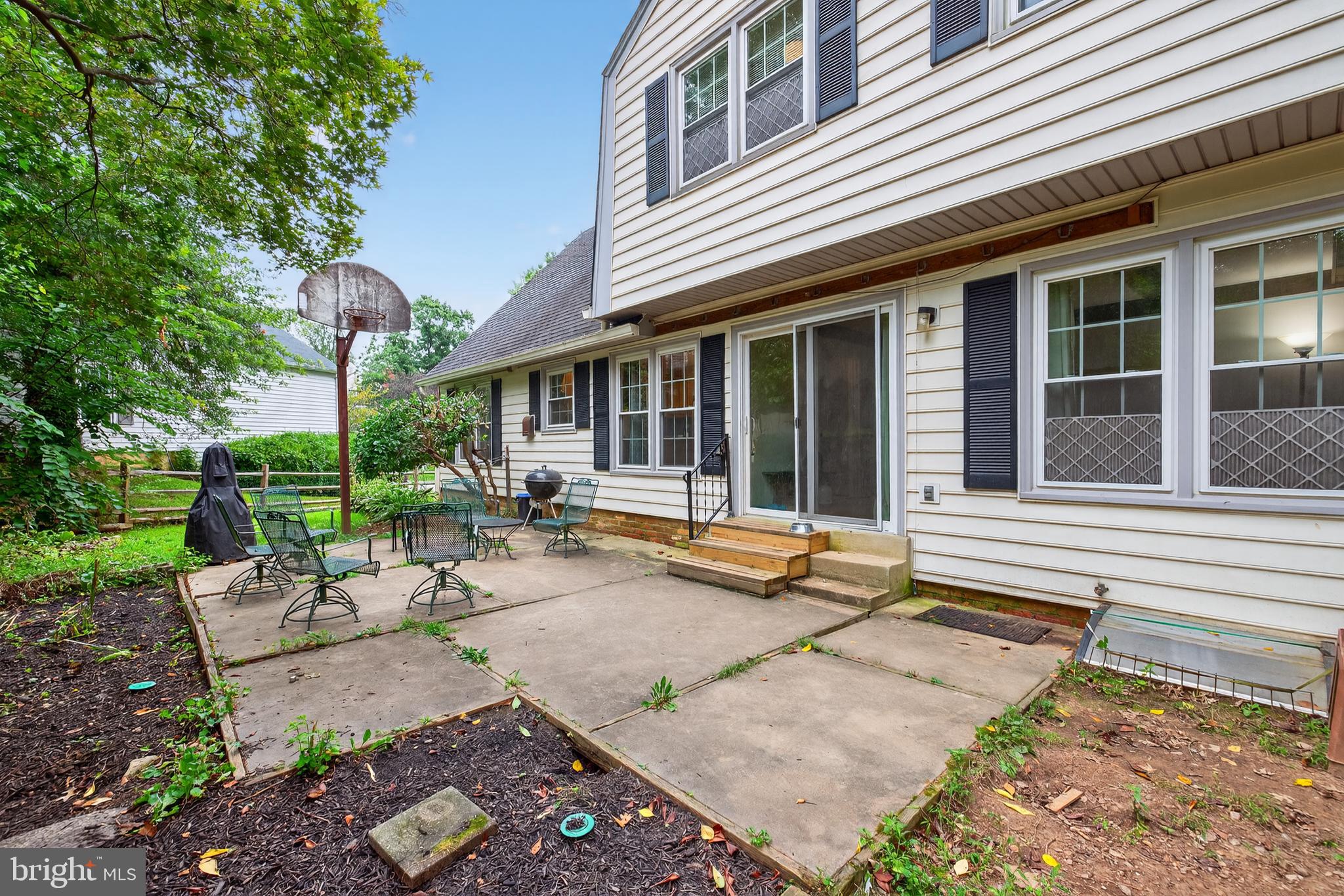 20080 Doolittle Street Gaithersburg, MD 20886 - Photo 39 of 48 a view of a house with backyard and sitting area