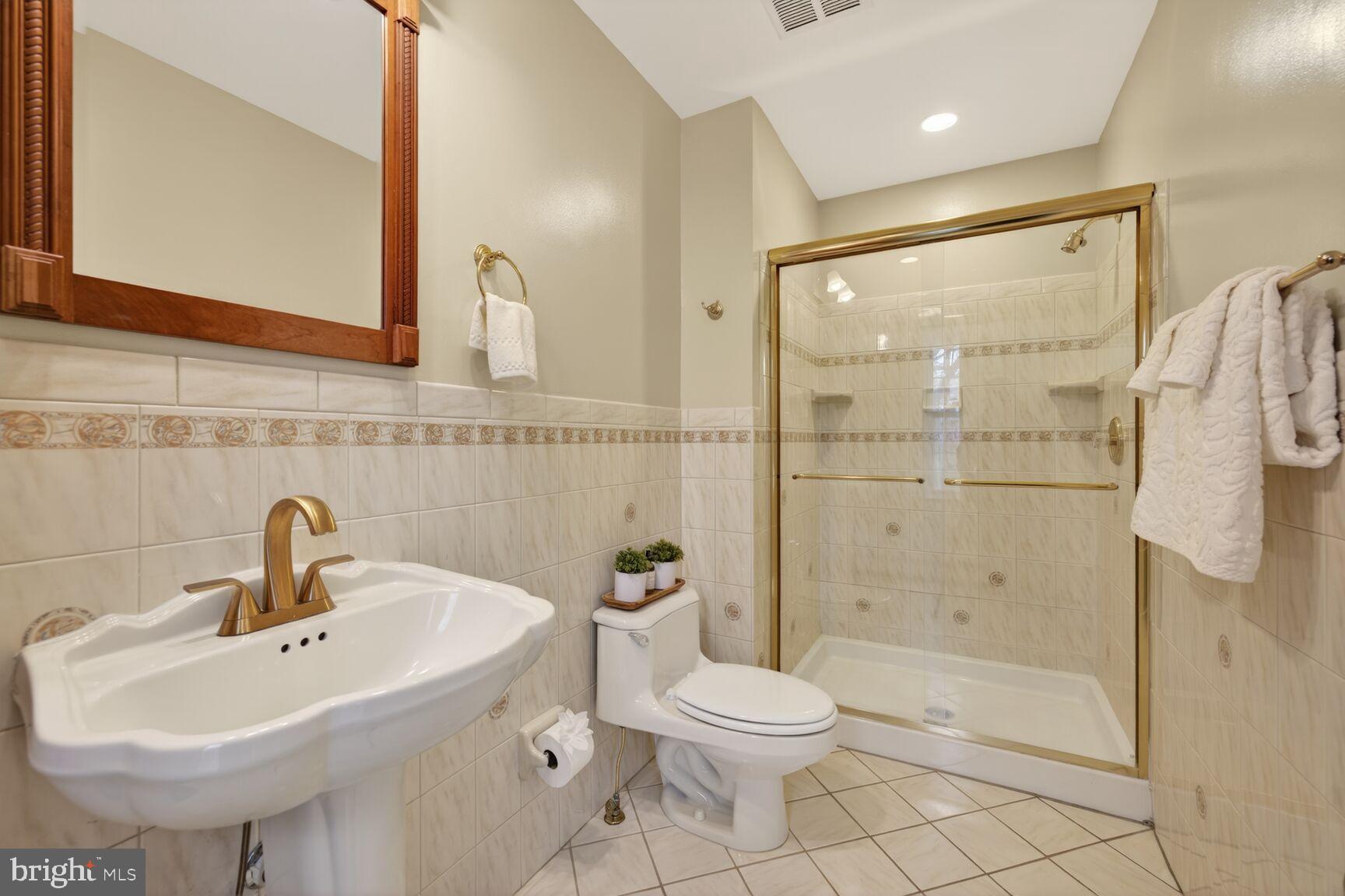2306 Eagle Rock Place Silver Spring, MD 20906 - Photo 13 of 30 Beautiful en-suite bathroom with modern fixtures.