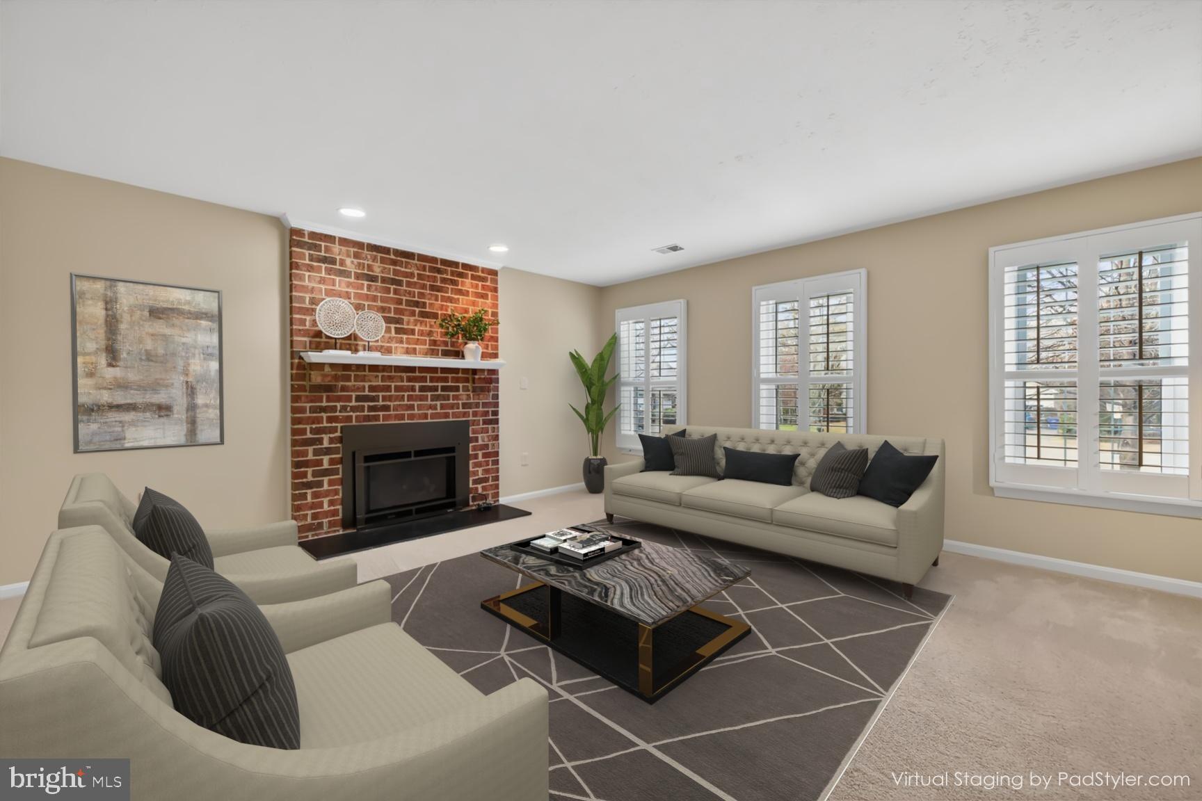 2306 Eagle Rock Place Silver Spring, MD 20906 - Photo 19 of 30 Stunning brick gas fireplace & plantation blinds.