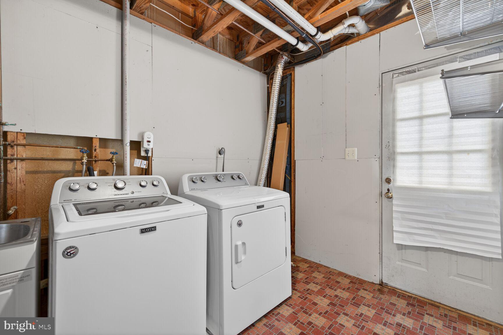 2306 Eagle Rock Place Silver Spring, MD 20906 - Photo 22 of 30 Functional laundry space with natural light.