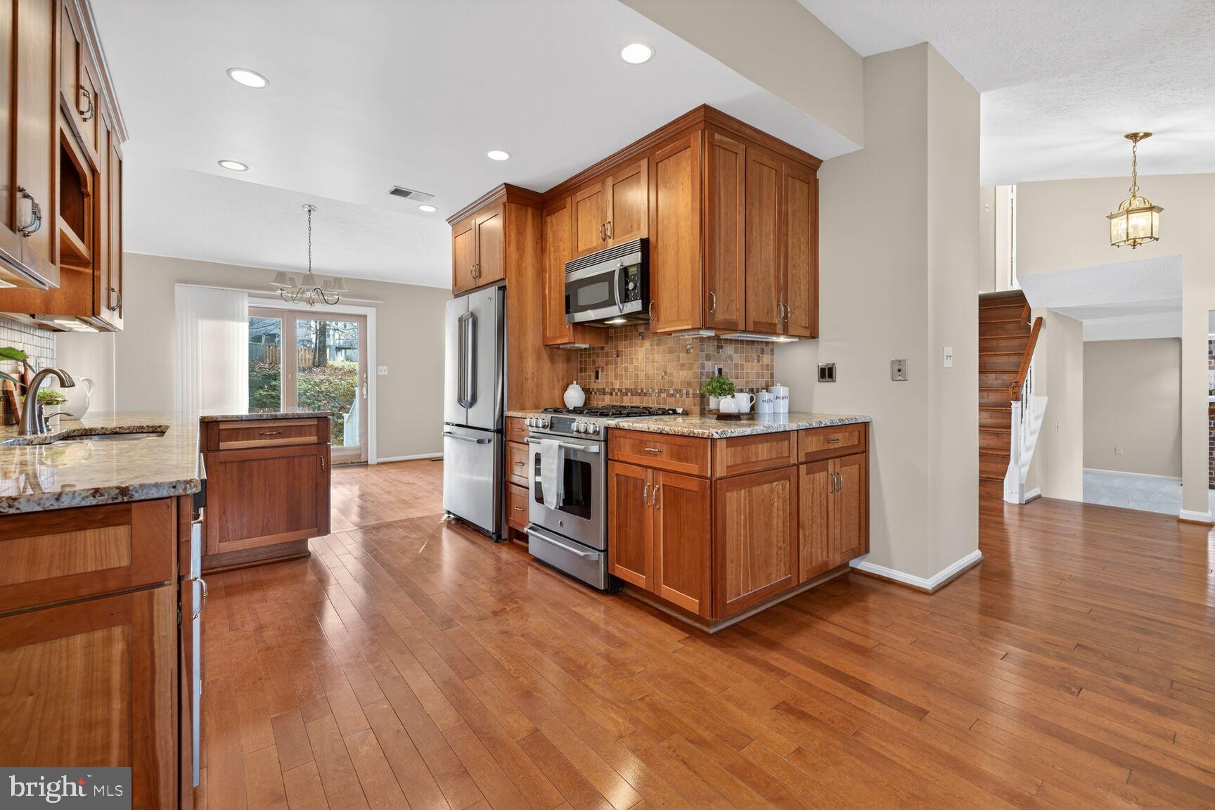 2306 Eagle Rock Place Silver Spring, MD 20906 - Photo 8 of 30 Stainless-steel appliances & custom cabinets