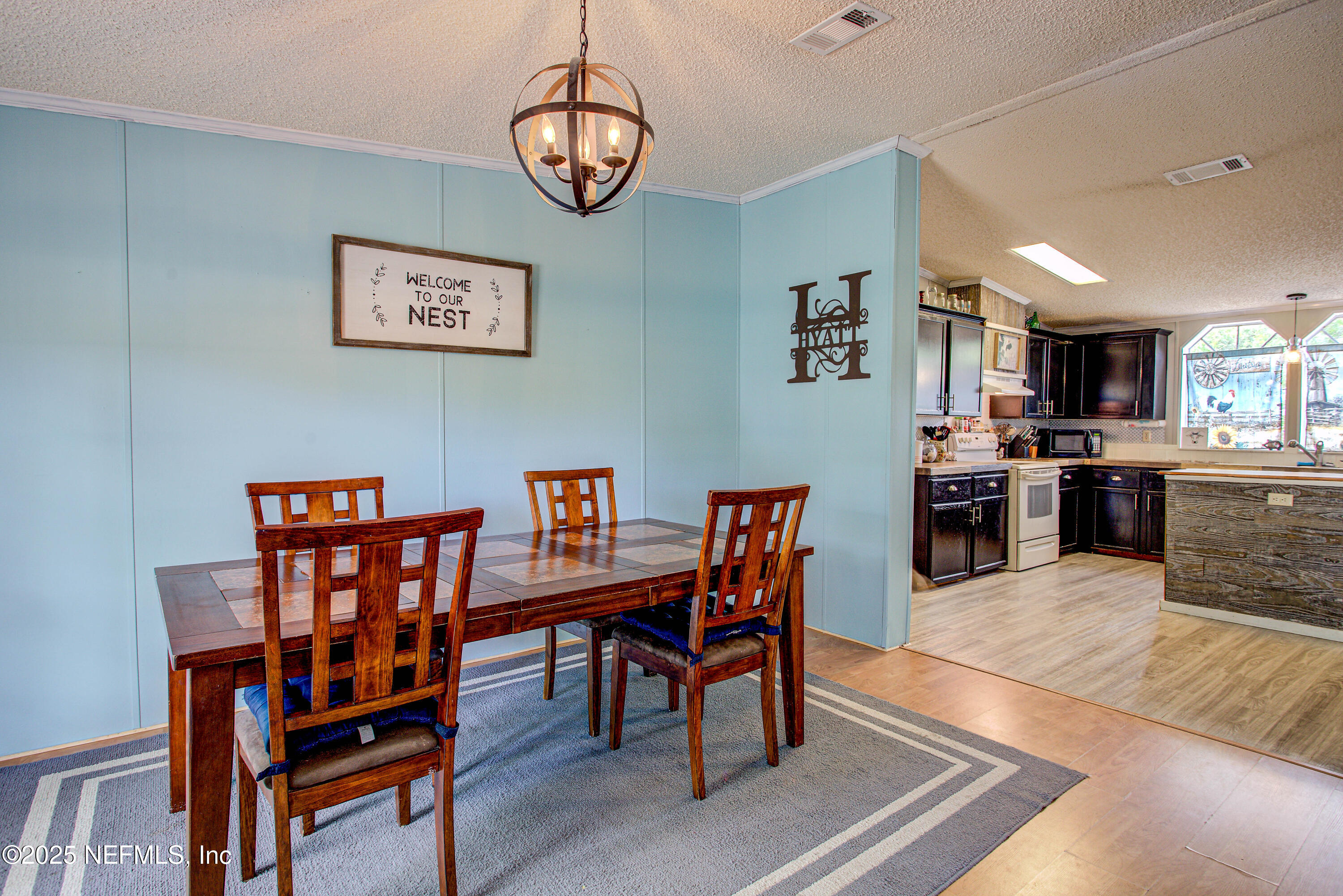 7630 Oak Forest Road Keystone Heights, FL 32656 - Photo 18 of 70 a view of a dining room with furniture
