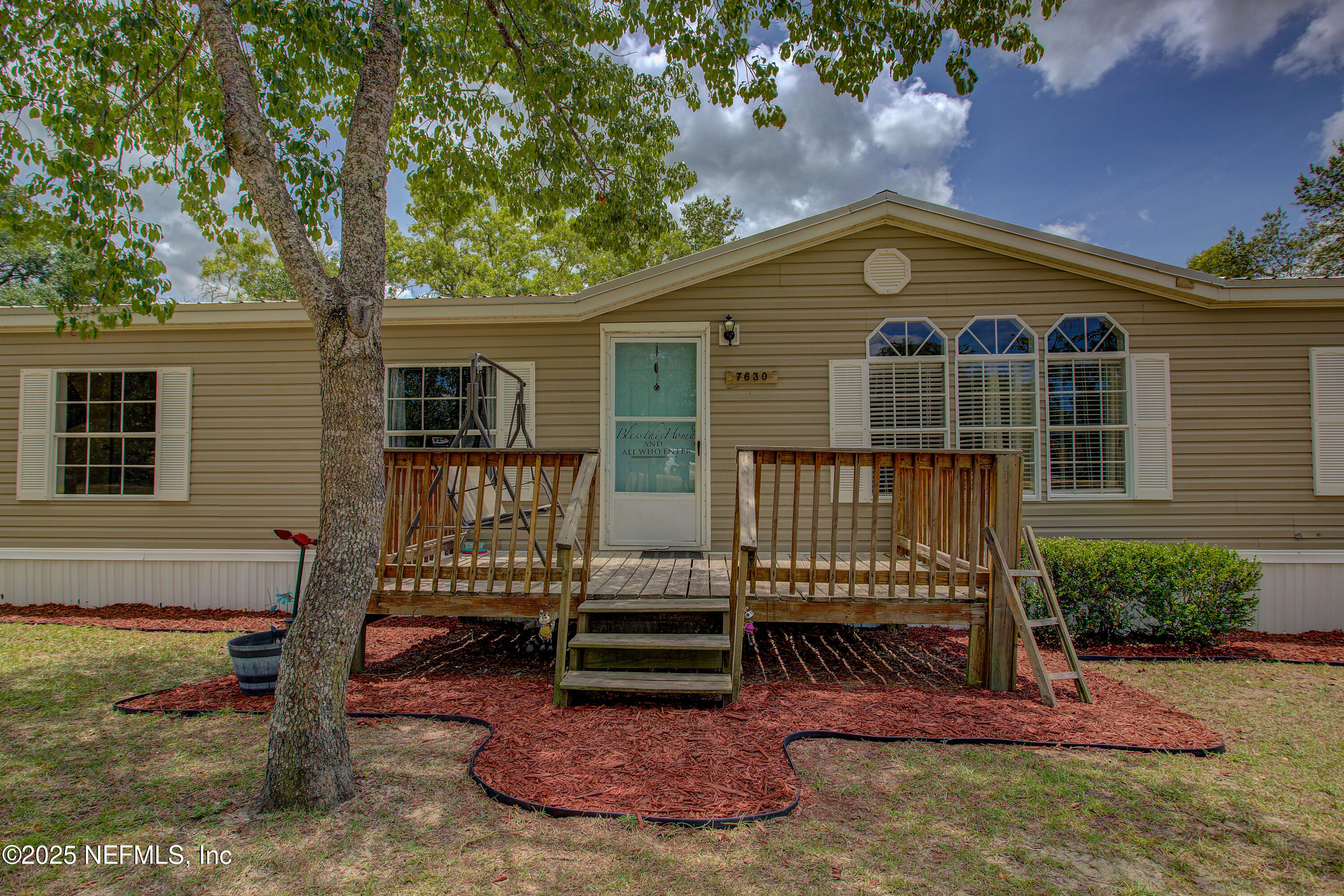 7630 Oak Forest Road Keystone Heights, FL 32656 - Photo 4 of 70 a view of a house with a yard