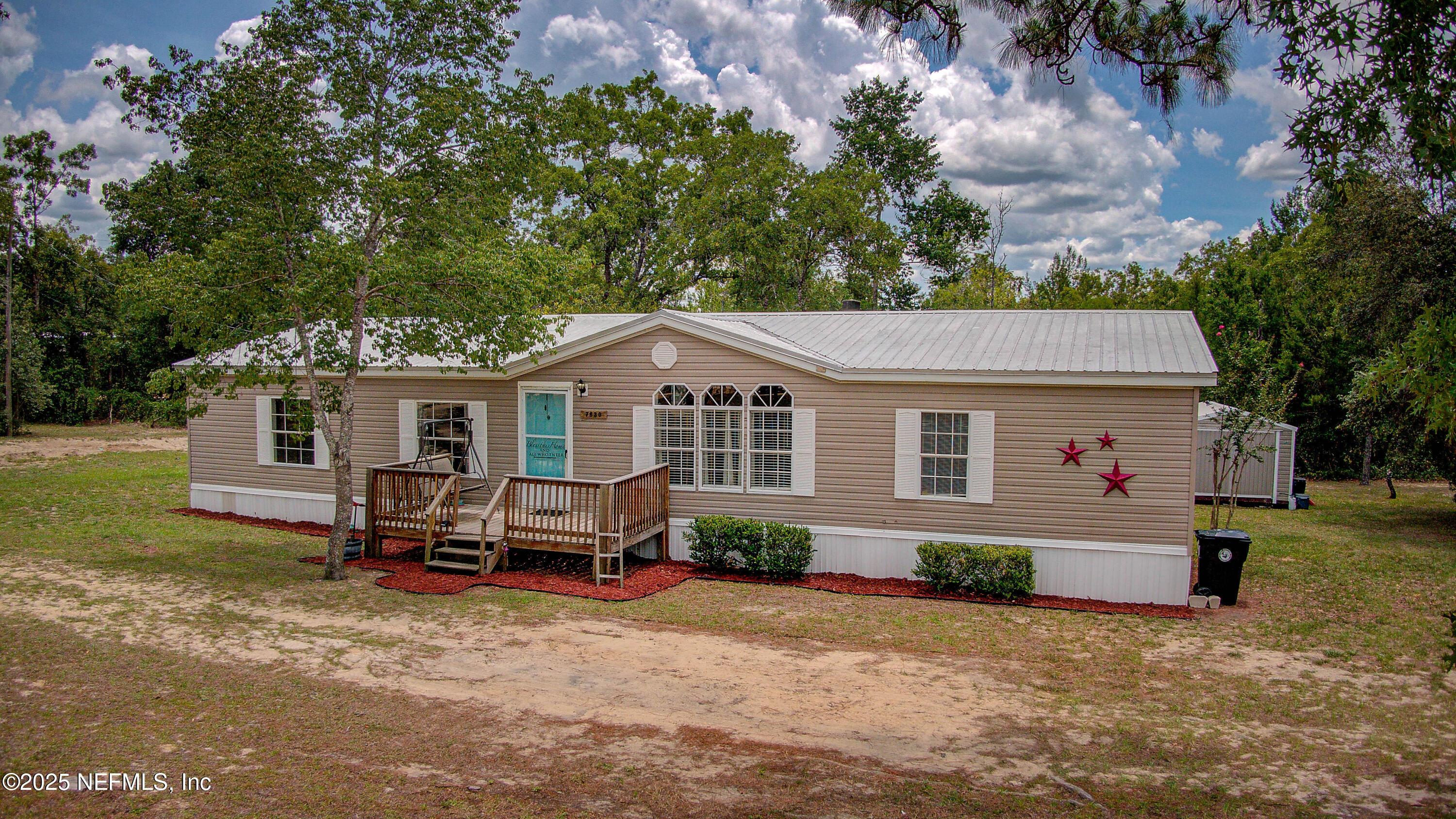 7630 Oak Forest Road Keystone Heights, FL 32656 - Photo 6 of 70 a front view of a house with a yard