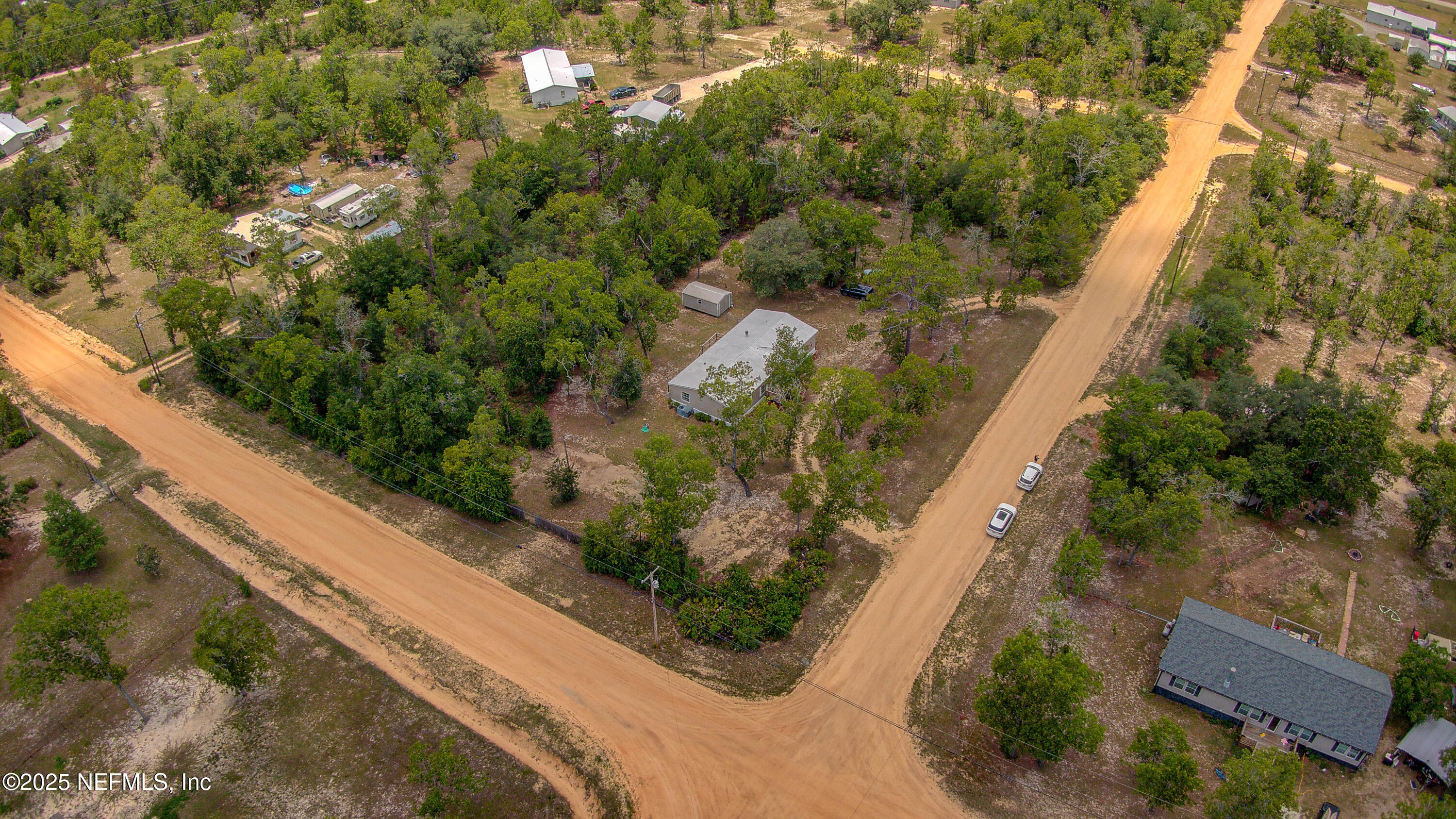7630 Oak Forest Road Keystone Heights, FL 32656 - Photo 62 of 70 a view of a yard with potted plants
