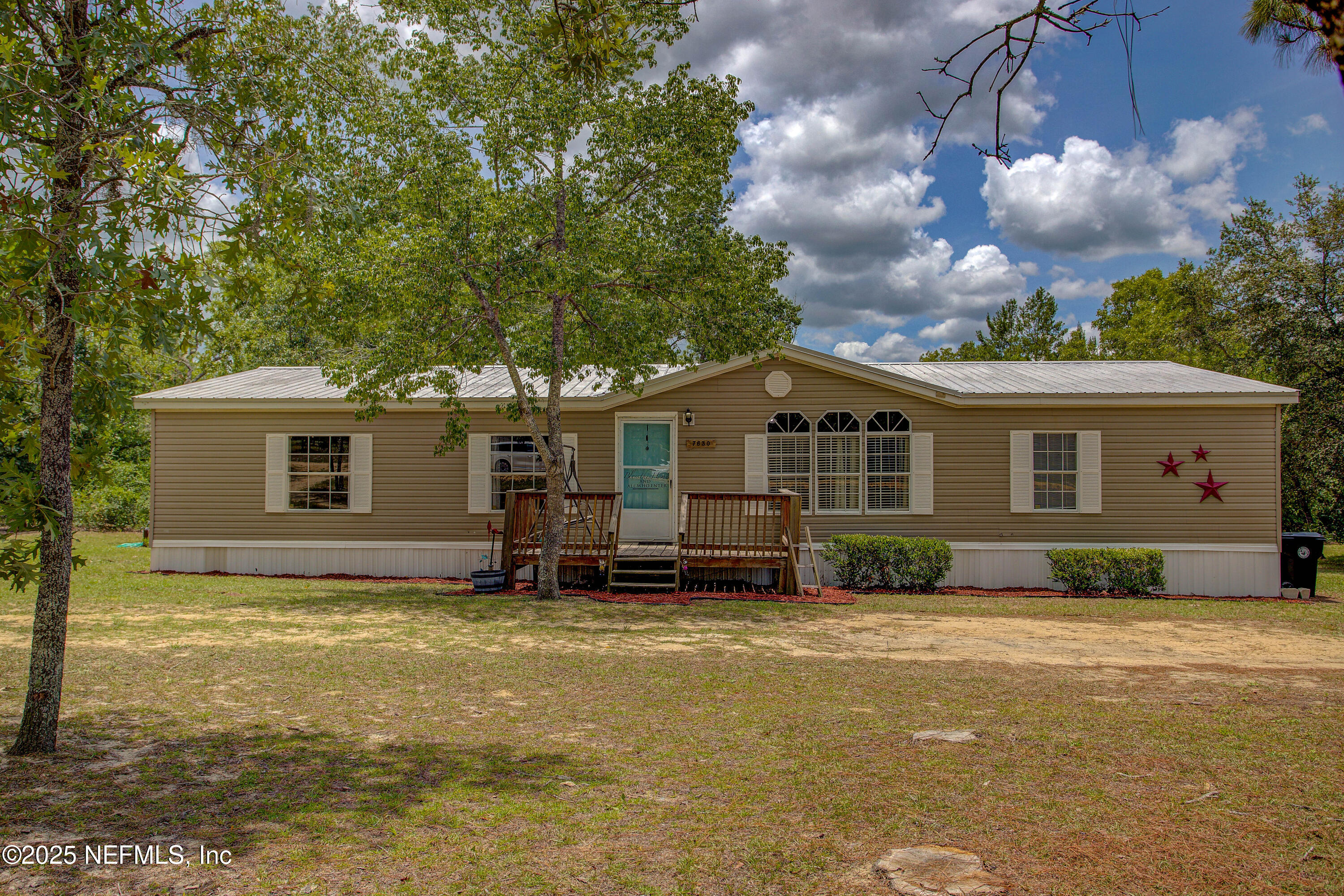 7630 Oak Forest Road Keystone Heights, FL 32656 - Photo 69 of 70 a view of a house with a yard