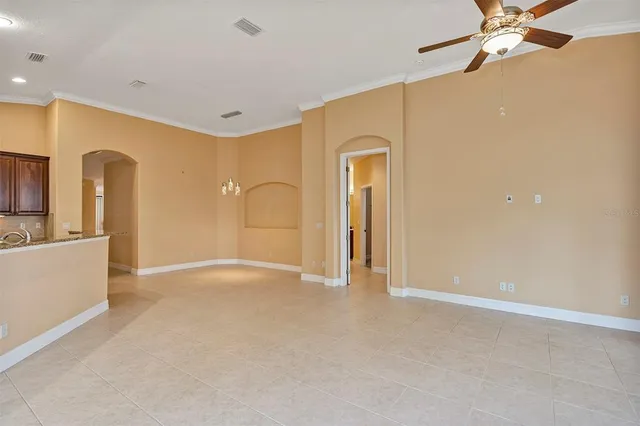 a view of a kitchen with a sink and cabinets