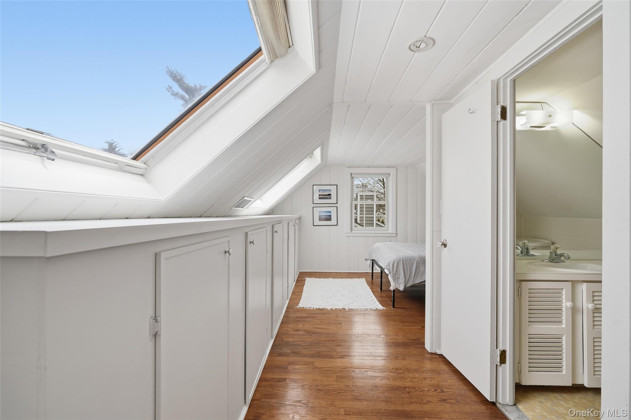 22 Brookdale Place Rye, NY 10580 - Photo 17 of 28 3rd floor bedroom featuring skylights, vaulted ceiling