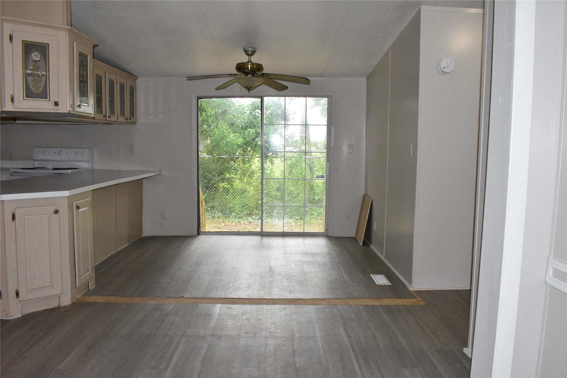 22530 Yancy Road Porter, TX 77365 - Photo 15 of 34 a view of empty room with wooden floor and fan