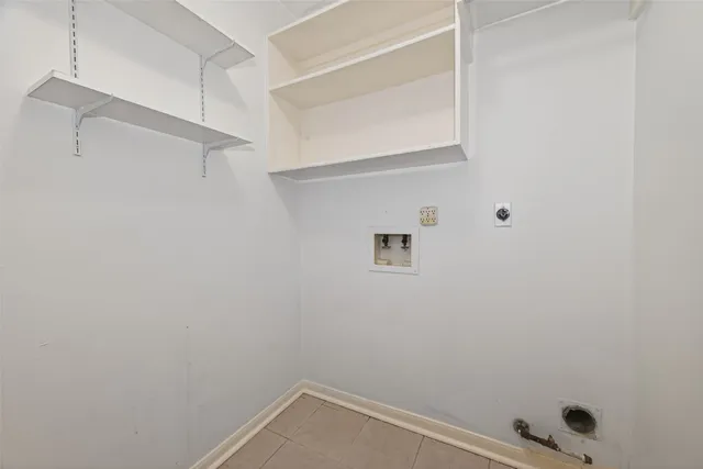 a view of small space with racks on the wall