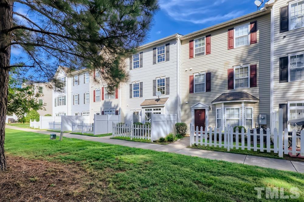 8610 Neuse Landing Lane, Unit 109 Raleigh, NC 27616 - Photo 2 of 28 a front view of house with a garden