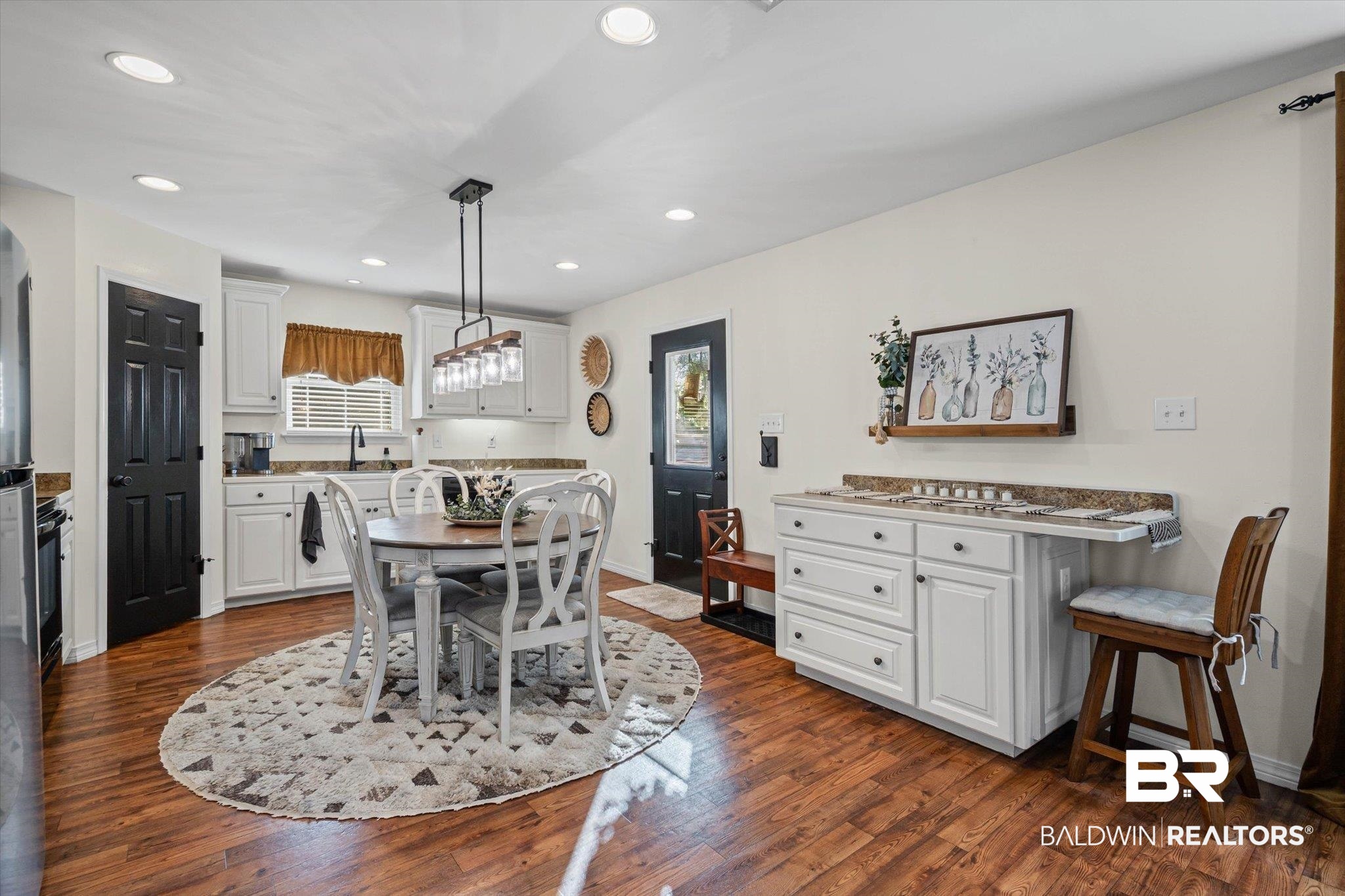 4567 Pine Avenue Saraland, AL 36571 - Photo 25 of 48 Dining space with recessed lighting and dark wood-type flooring