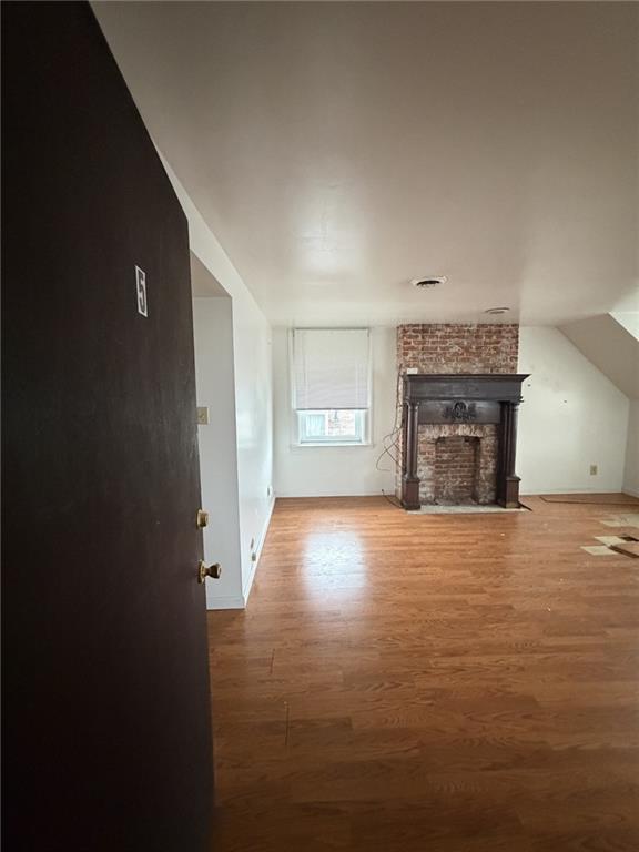 5807 Bartlett Street, Unit 5 Pittsburgh, PA 15217 - Photo 6 of 18 a view of empty room with a fireplace