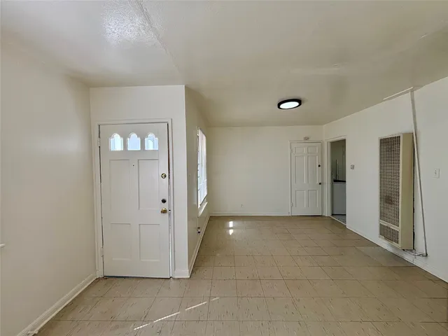 a view of a livingroom with a hallway