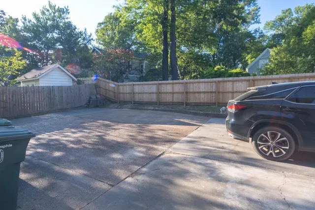 a view of a back yard of the house