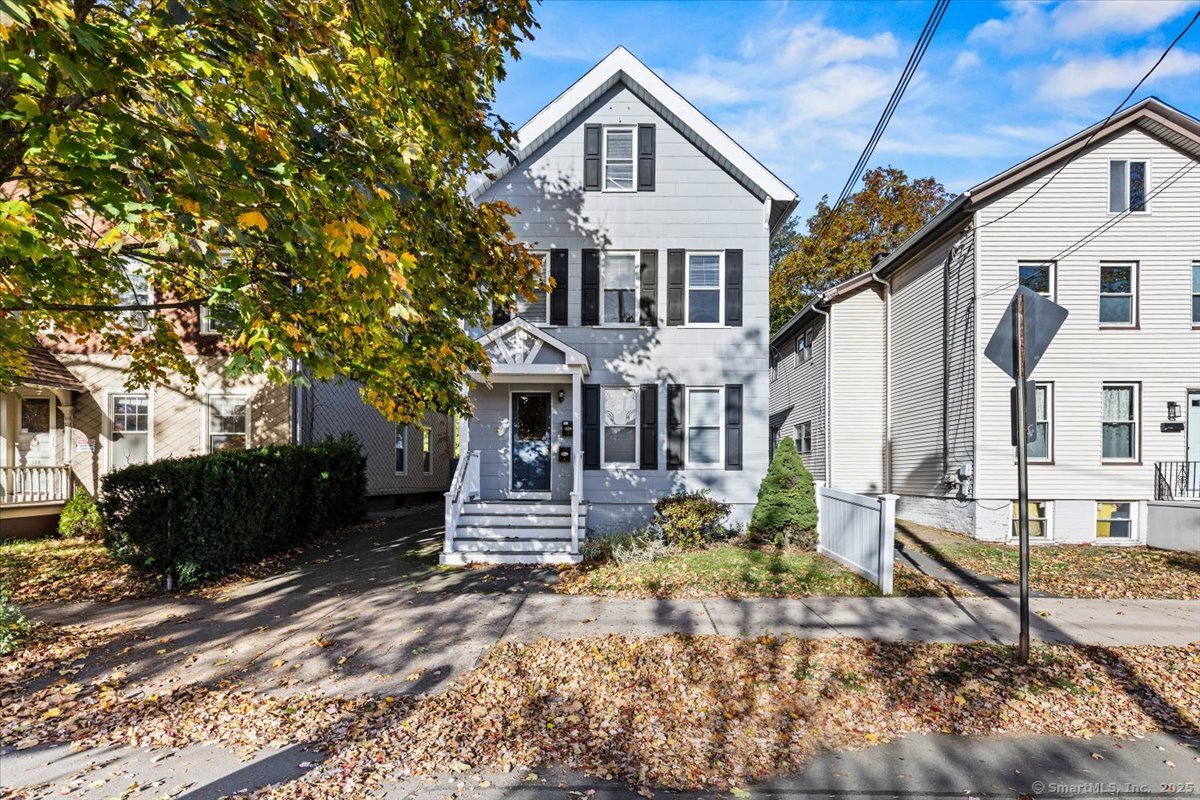 136 Nash Street New Haven, CT 06511 - Photo 1 of 10 a front view of a house with a yard