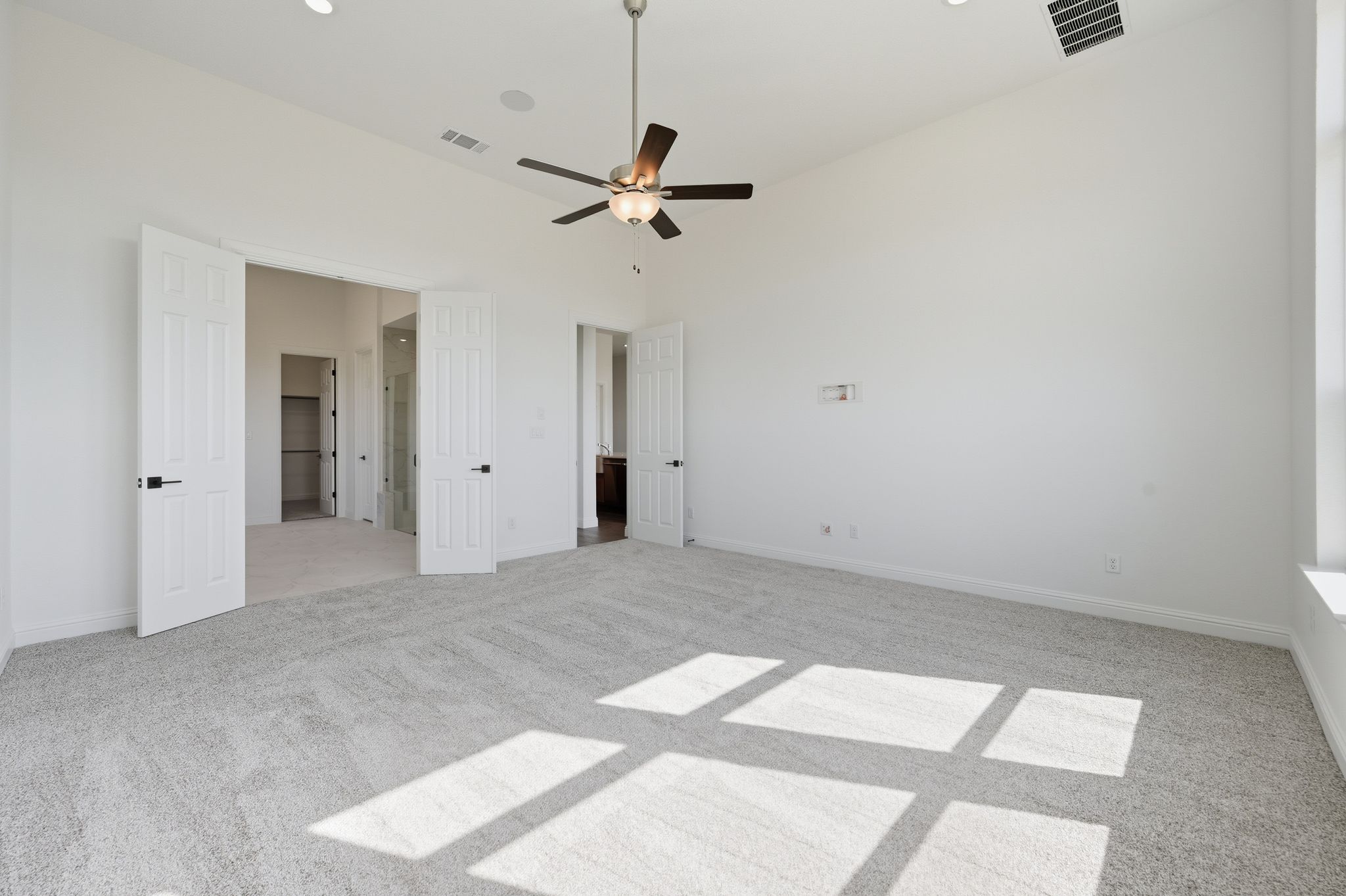 216 Moria Court Georgetown, TX 78628 - Photo 14 of 30 Unfurnished bedroom with light colored carpet and a ceiling fan
