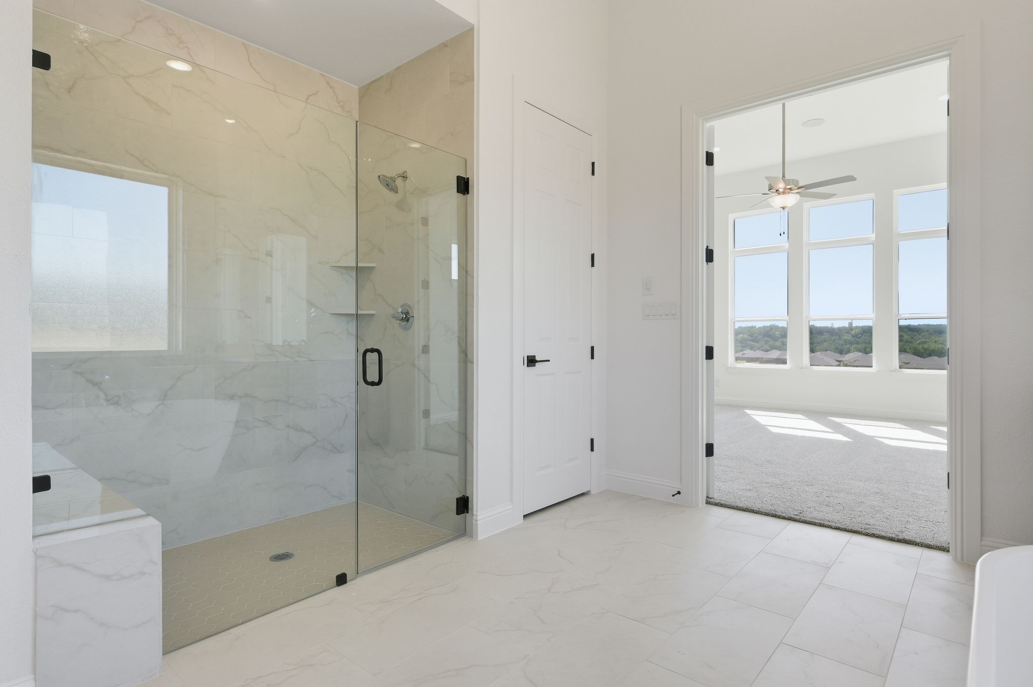 216 Moria Court Georgetown, TX 78628 - Photo 16 of 30 Full bath featuring a marble finish shower, marble finish floors, and ceiling fan