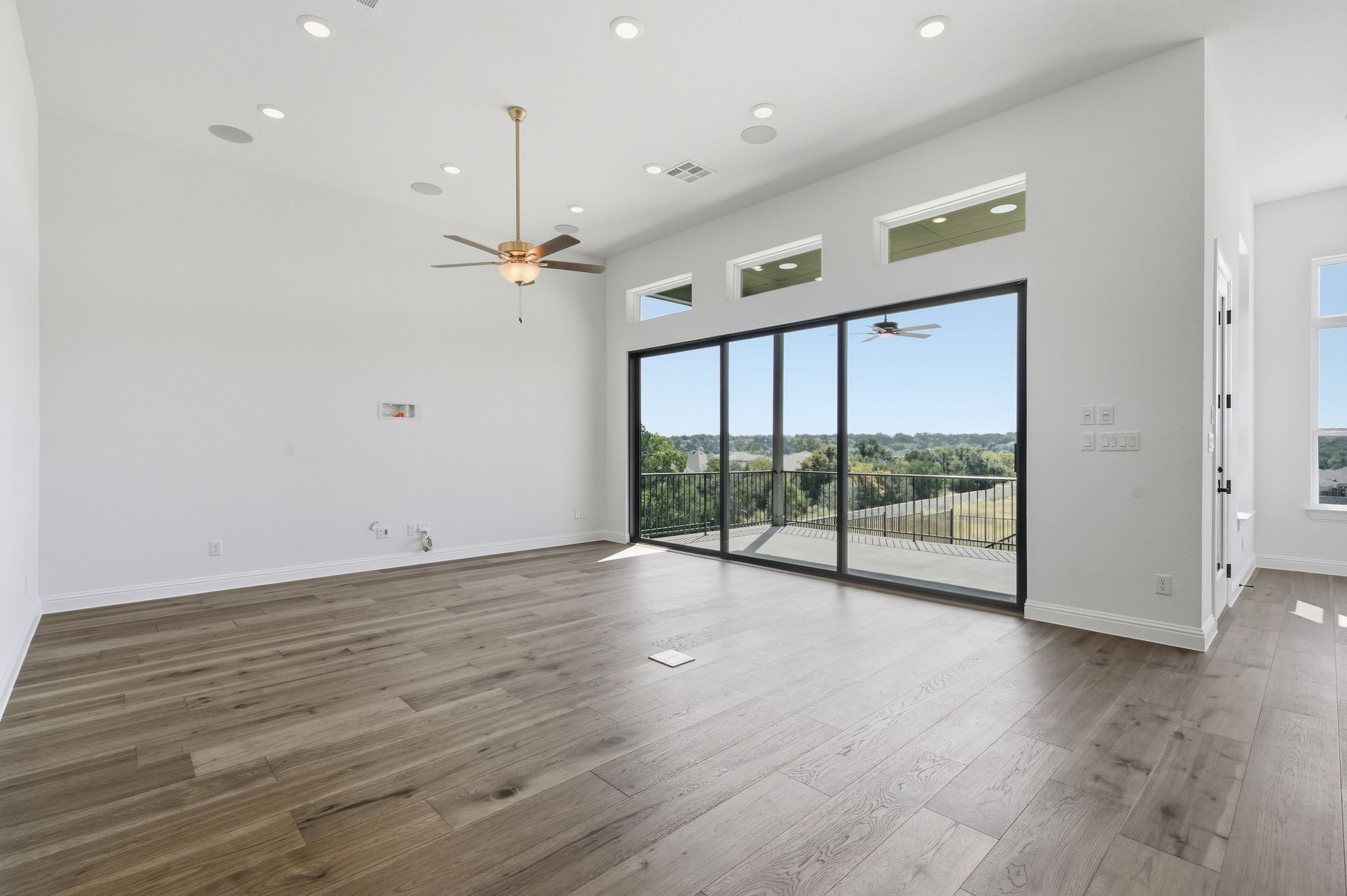 216 Moria Court Georgetown, TX 78628 - Photo 5 of 30 Unfurnished room featuring light wood-style floors and recessed lighting