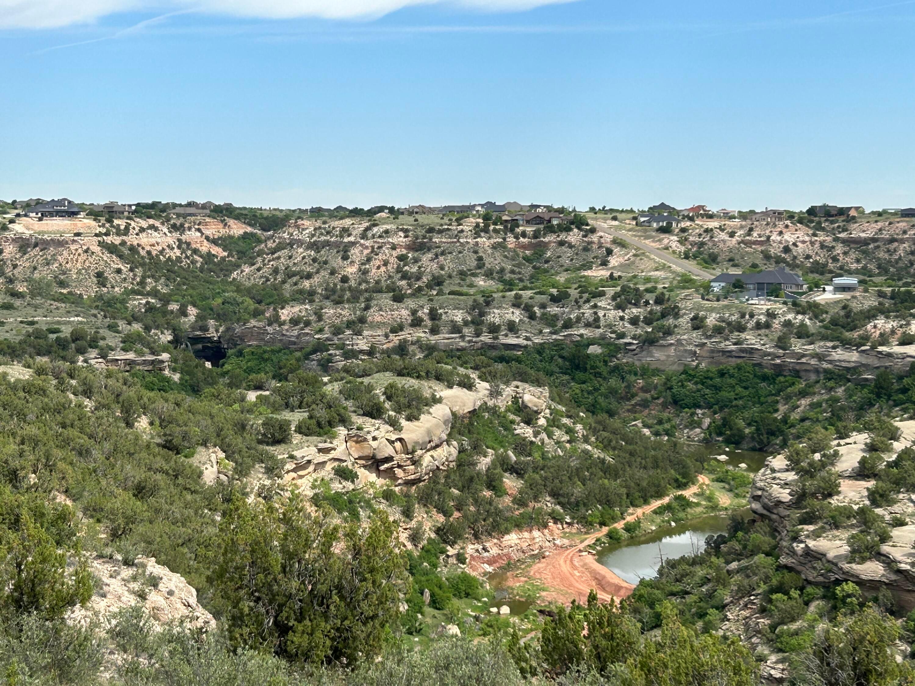 7601 Distant View Drive Amarillo, TX 79118 - Photo 23 of 27 an aerial view of house with yard and mountain view in back