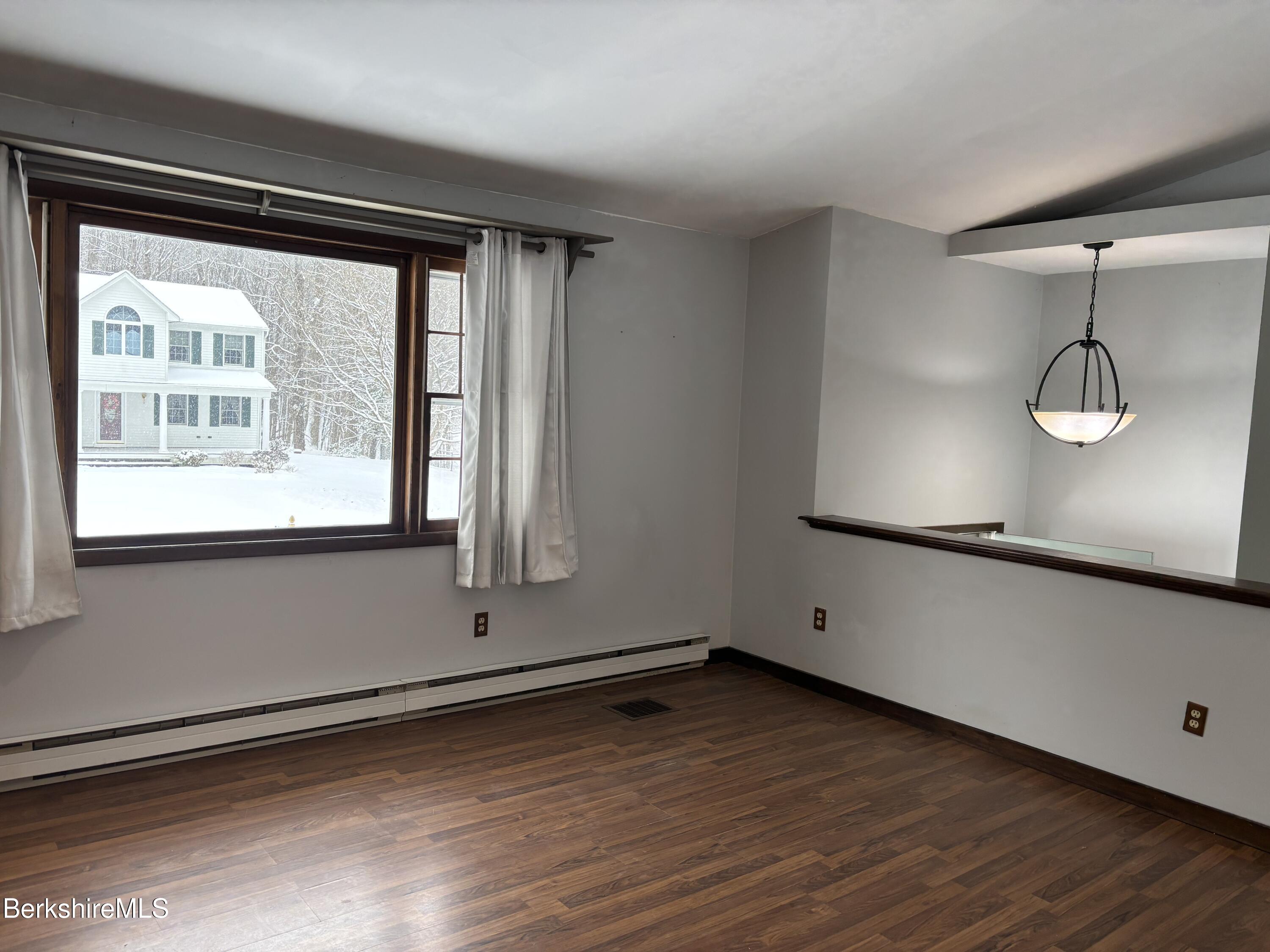 39 Barton Hill Road Dalton, MA 01226 - Photo 12 of 38 a view of a room with wooden floor and window
