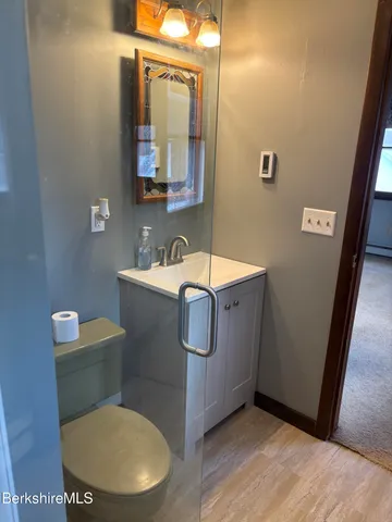 a bathroom with a toilet a sink and bathtub