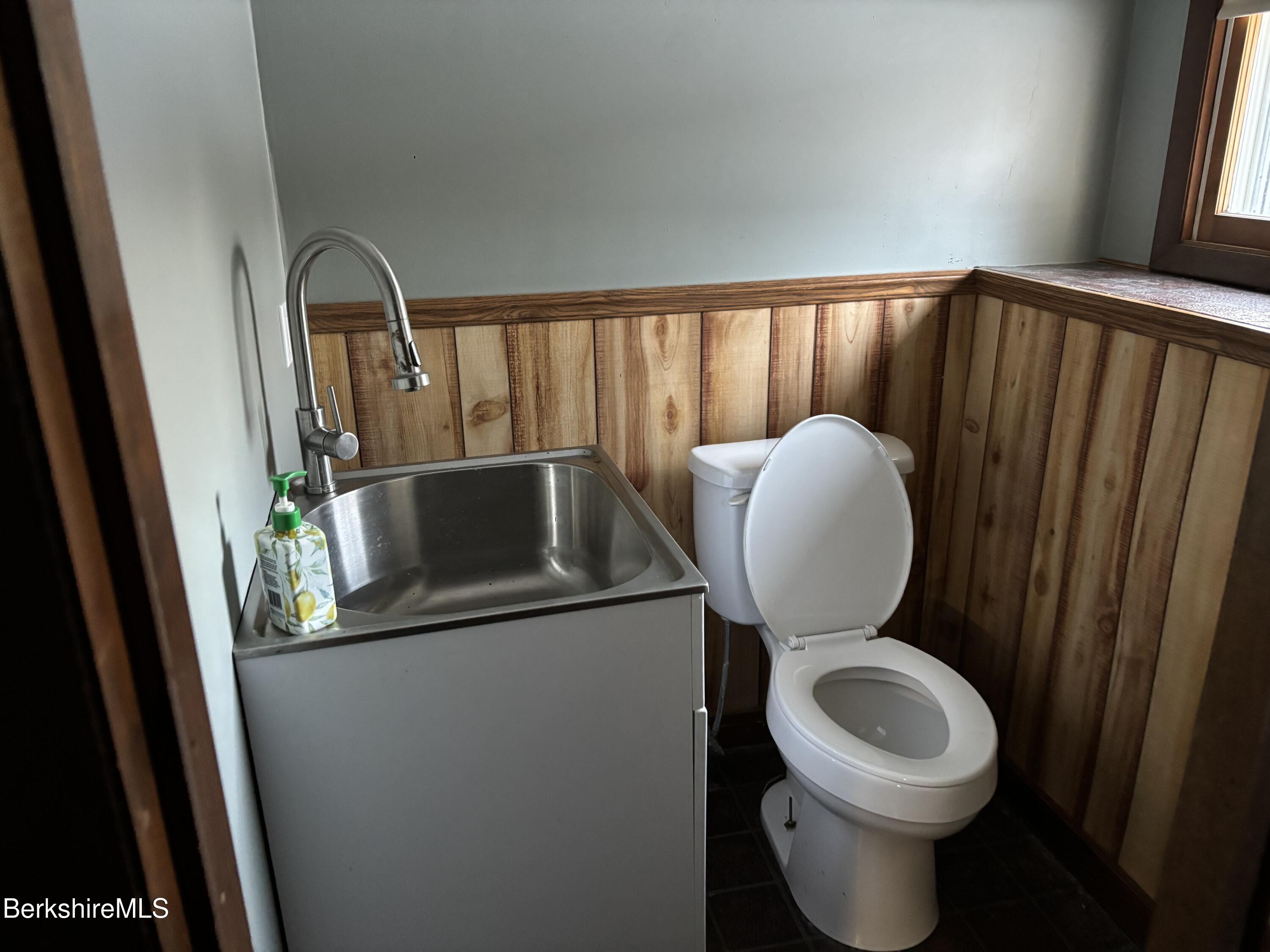 39 Barton Hill Road Dalton, MA 01226 - Photo 28 of 38 a bathroom with a toilet sink and mirror