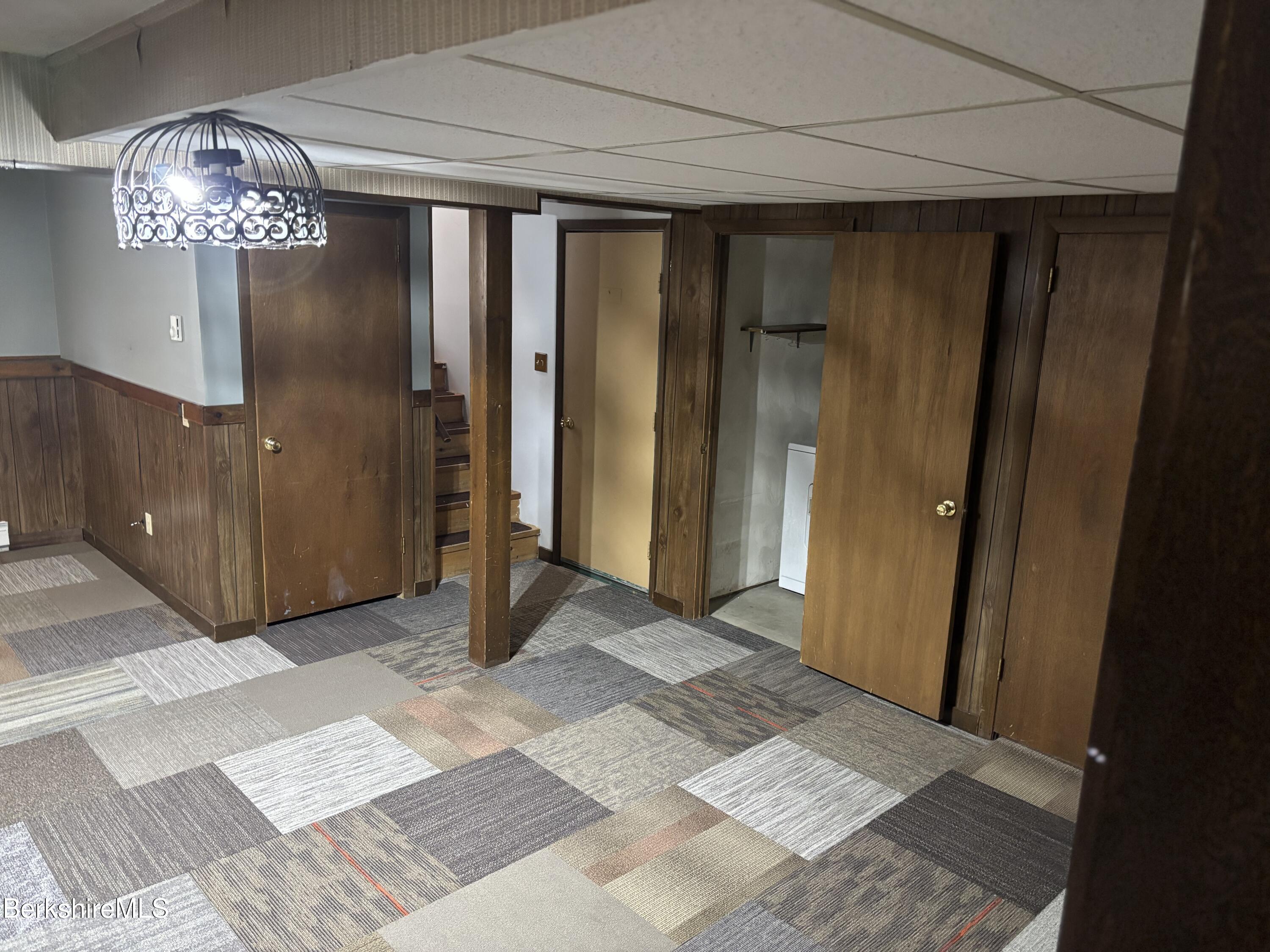 39 Barton Hill Road Dalton, MA 01226 - Photo 33 of 38 a view of a hallway with a chandelier