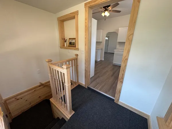 a view of a hallway with windows