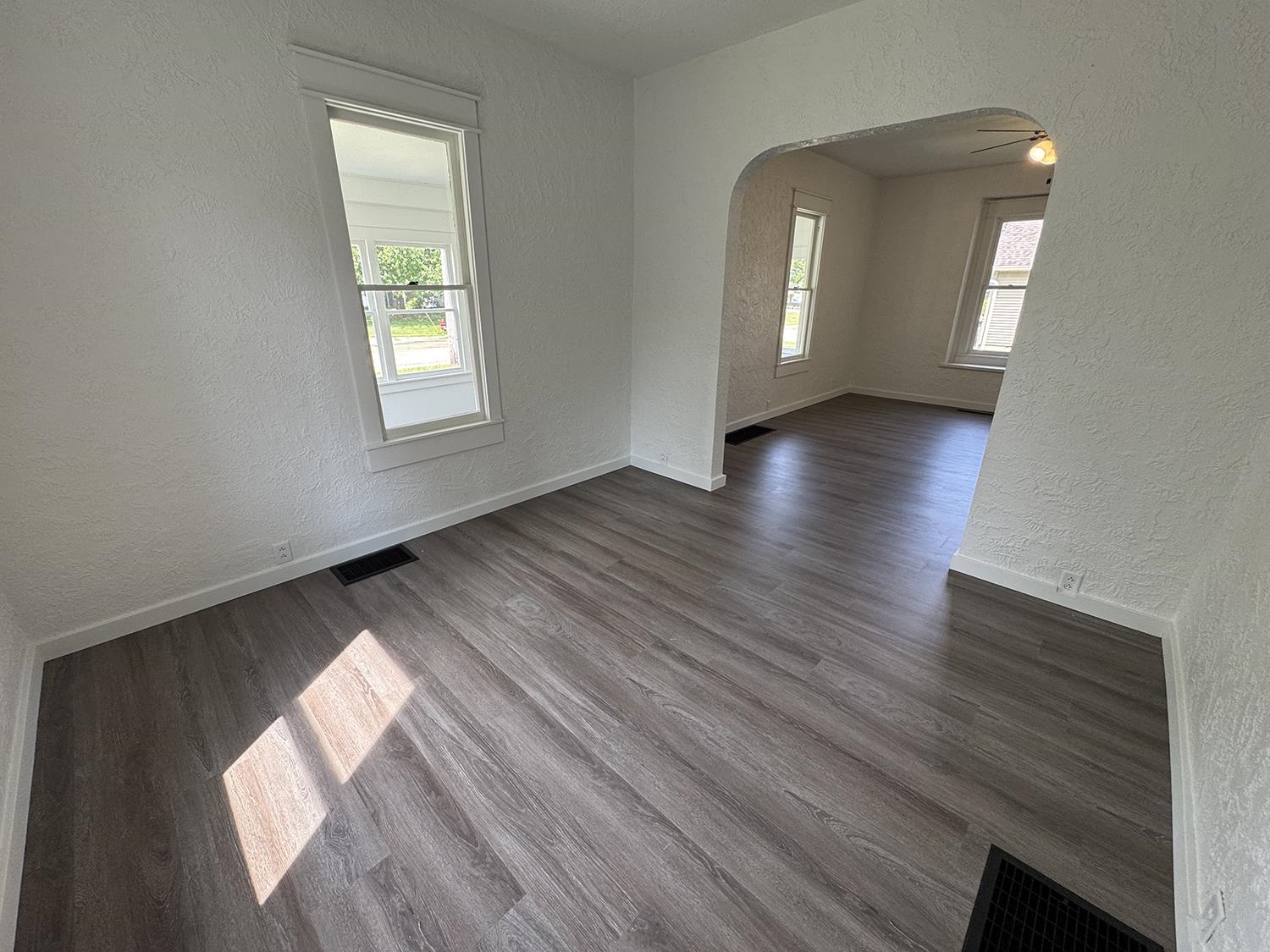 101 East Division Road Shannon, IL 61078 - Photo 25 of 52 a view of empty room with wooden floor and fan