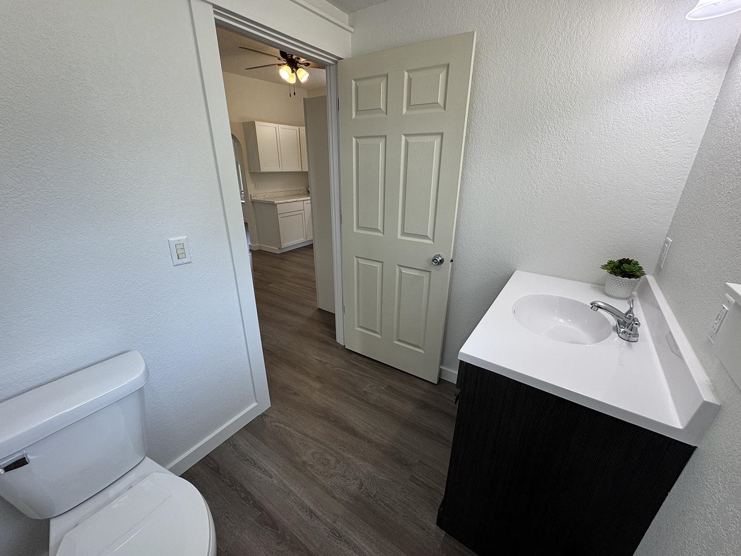 101 East Division Road Shannon, IL 61078 - Photo 32 of 52 a bathroom with a sink toilet and vanity