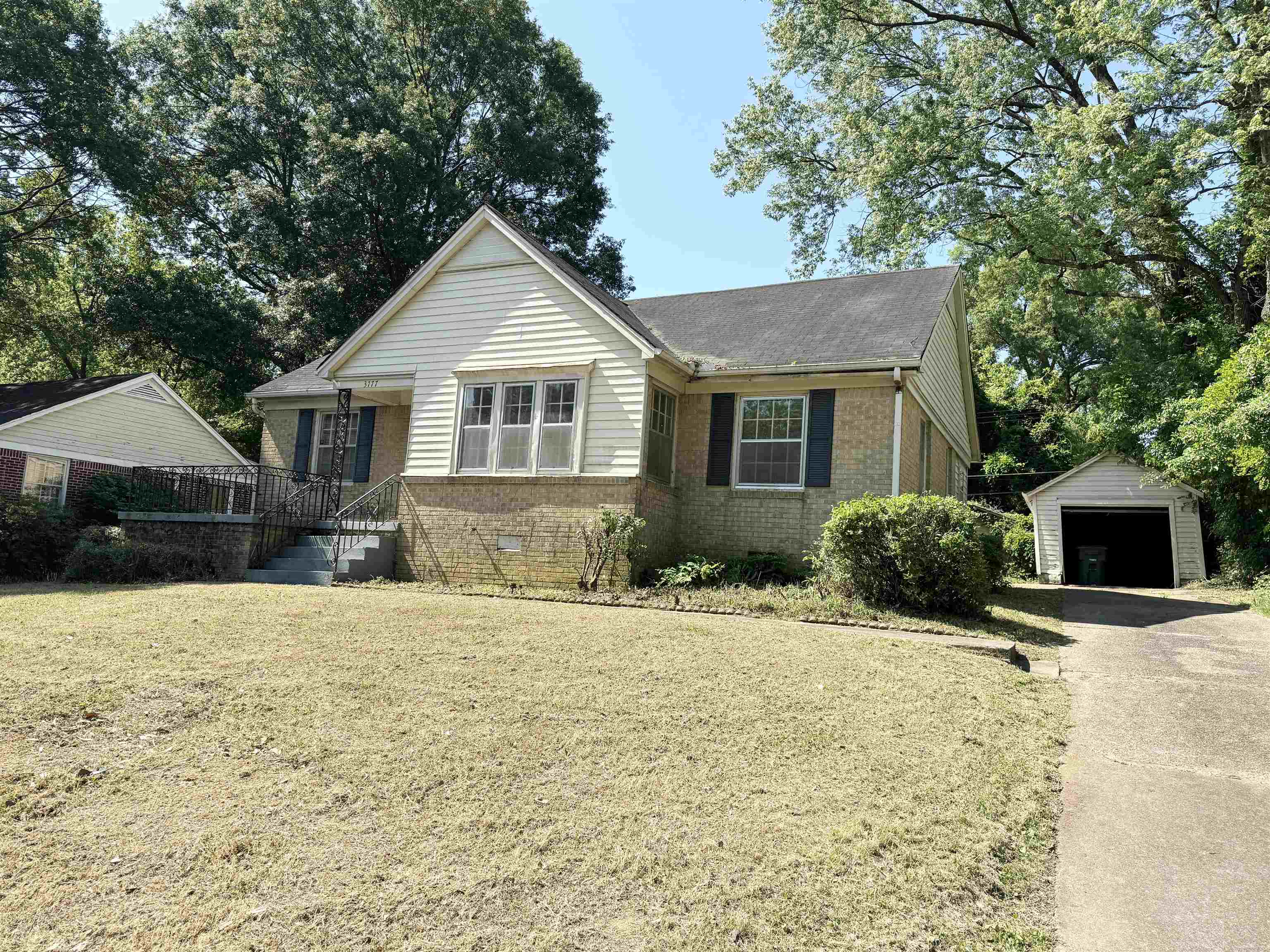 3777 Healey Road Memphis, TN 38111 - Photo 3 of 15 a front view of a house with a yard