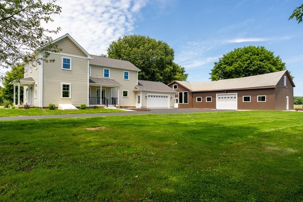 70 Depot Road Hatfield, MA 01038 - Photo 1 of 42 a front view of house with yard and green space