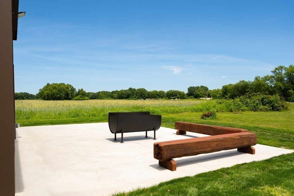 70 Depot Road Hatfield, MA 01038 - Photo 12 of 42 a swimming pool with outdoor seating and garden