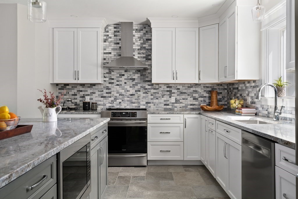 70 Depot Road Hatfield, MA 01038 - Photo 13 of 42 a kitchen with stainless steel appliances granite countertop a sink stove and cabinets