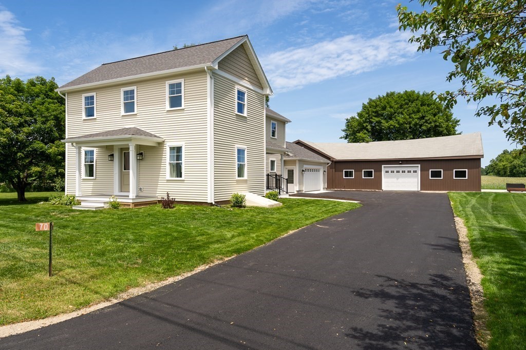 70 Depot Road Hatfield, MA 01038 - Photo 2 of 42 a front view of a house with a yard