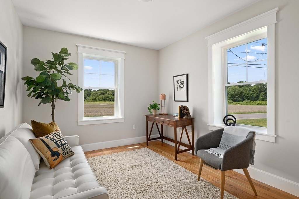 70 Depot Road Hatfield, MA 01038 - Photo 24 of 42 a living room with furniture and a potted plant