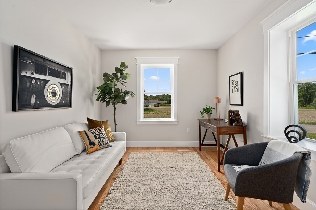 70 Depot Road Hatfield, MA 01038 - Photo 25 of 42 a living room with furniture and a potted plant