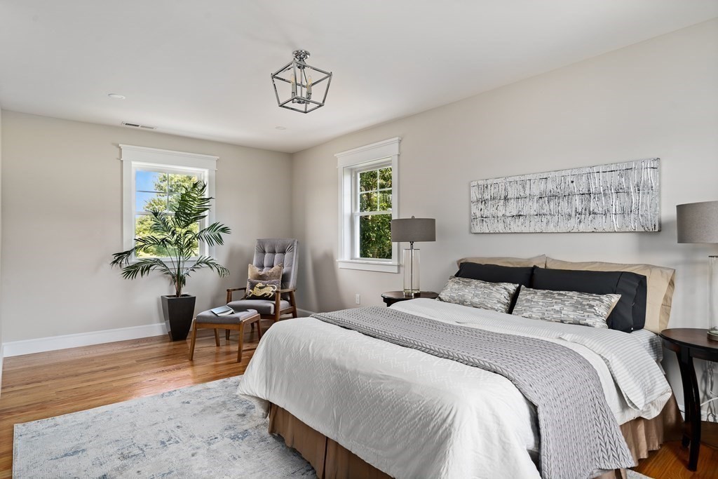70 Depot Road Hatfield, MA 01038 - Photo 30 of 42 a bedroom with bed and a potted plant