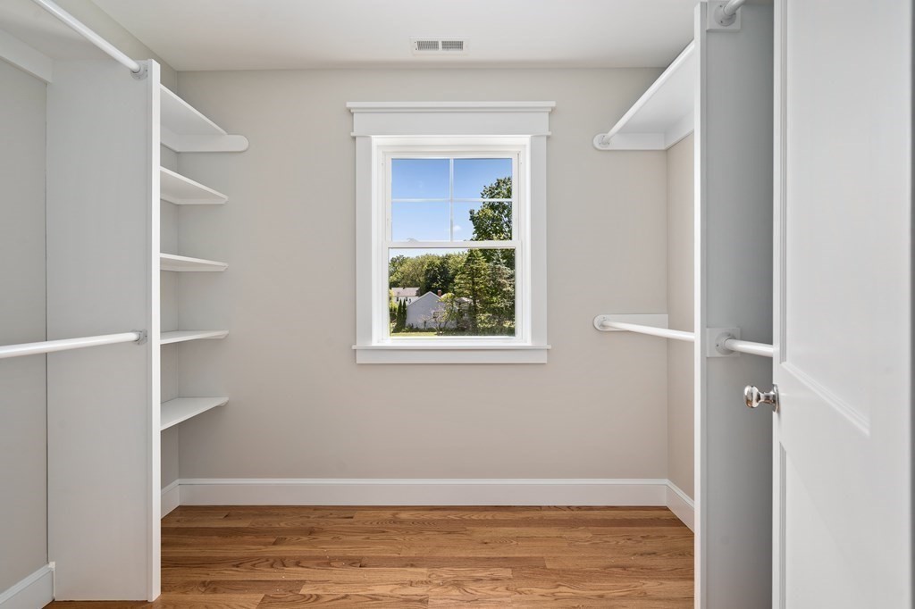 70 Depot Road Hatfield, MA 01038 - Photo 33 of 42 a view of an empty room with wooden floor and closet