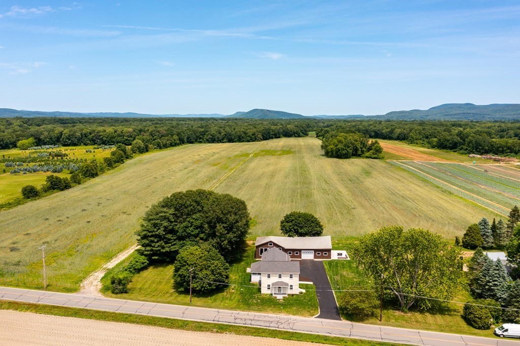 70 Depot Road Hatfield, MA 01038 - Photo 4 of 42 an aerial view of beach and residential houses with outdoor space