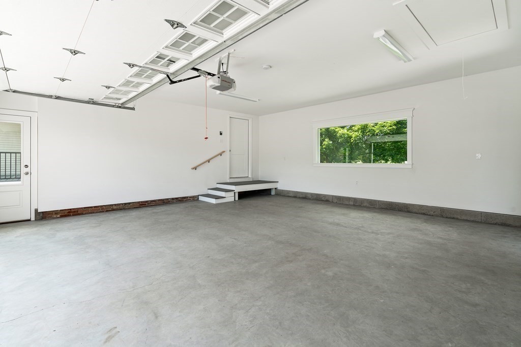70 Depot Road Hatfield, MA 01038 - Photo 42 of 42 an empty room with a ceiling fan and windows