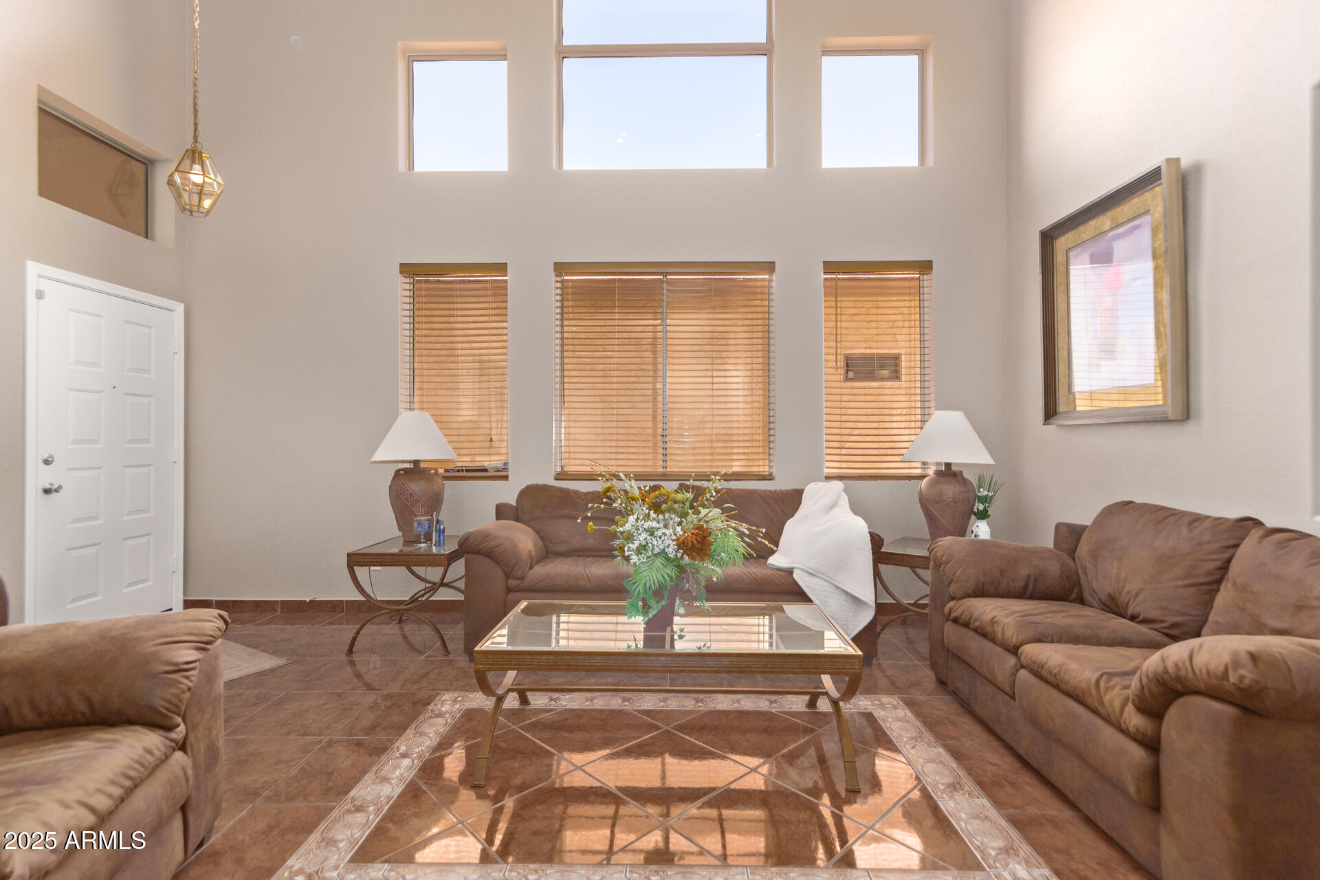 10521 West Berkeley Road Avondale, AZ 85392 - Photo 4 of 21 a living room with furniture and a large window