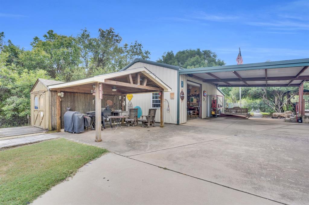 490 James Road Ferris, TX 75125 - Photo 39 of 40 Workshop and covered BBQ area