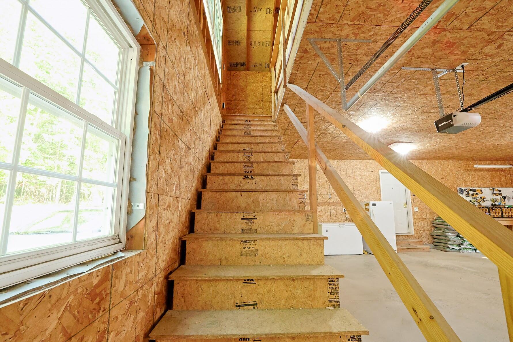 357 Kelley Road Hermon, ME 04401 - Photo 62 of 72 Stairs to Garage Storage Area
