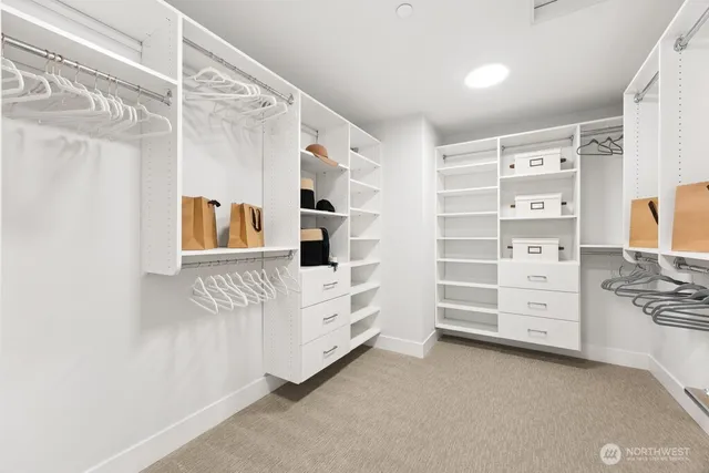 a view of an empty walk in closet