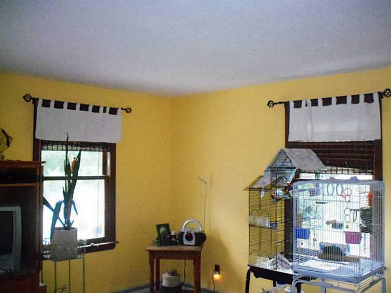 784 Lawrence Road Pownal, ME 04069 - Photo 5 of 13 Living Room. Bright and Sunny. South...